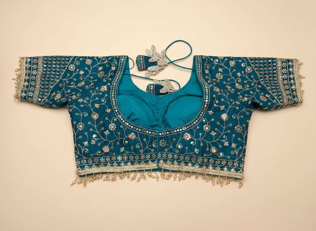 Embroidered blue cotton blouse