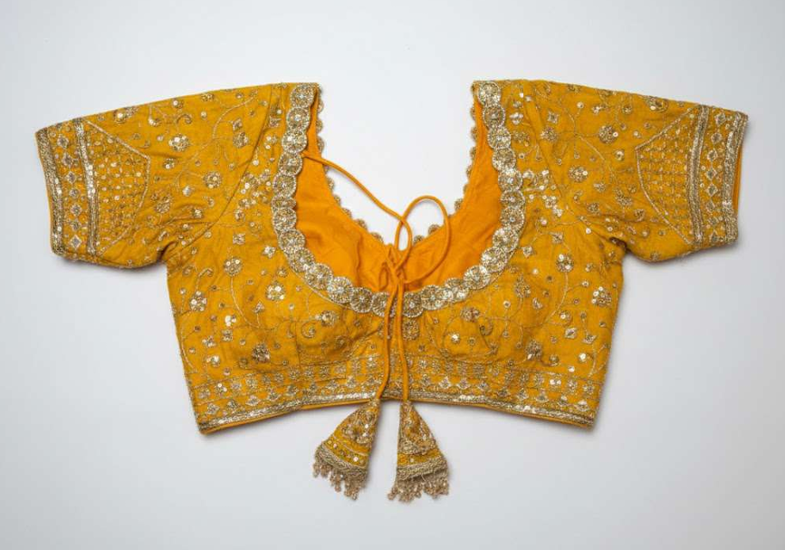 Embroidered yellow cotton blouse